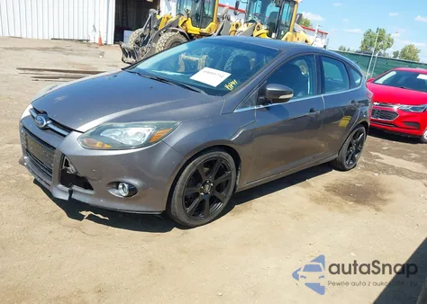 2014 Ford Focus Titanium z USA, uszkodzony, nr VIN 1FADP3N20EL257941